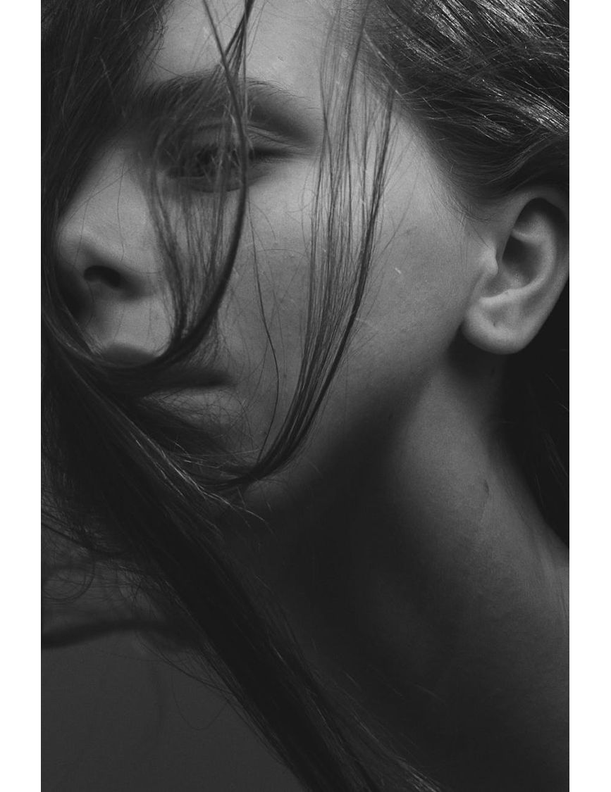 The Focused 'Inner World' Pose — Shy? Good. Leverage It.