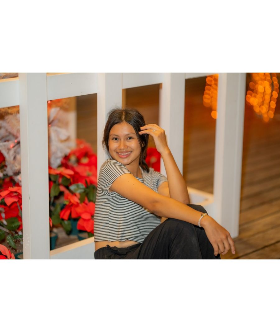 Seated Close-Up — On Location with Kristel: Warm Lights and Festive Tones