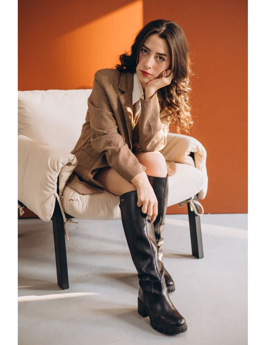 The Sculptural Knee-High Riding Boot — Your Shoes Are Sabotaging Your Portfolio